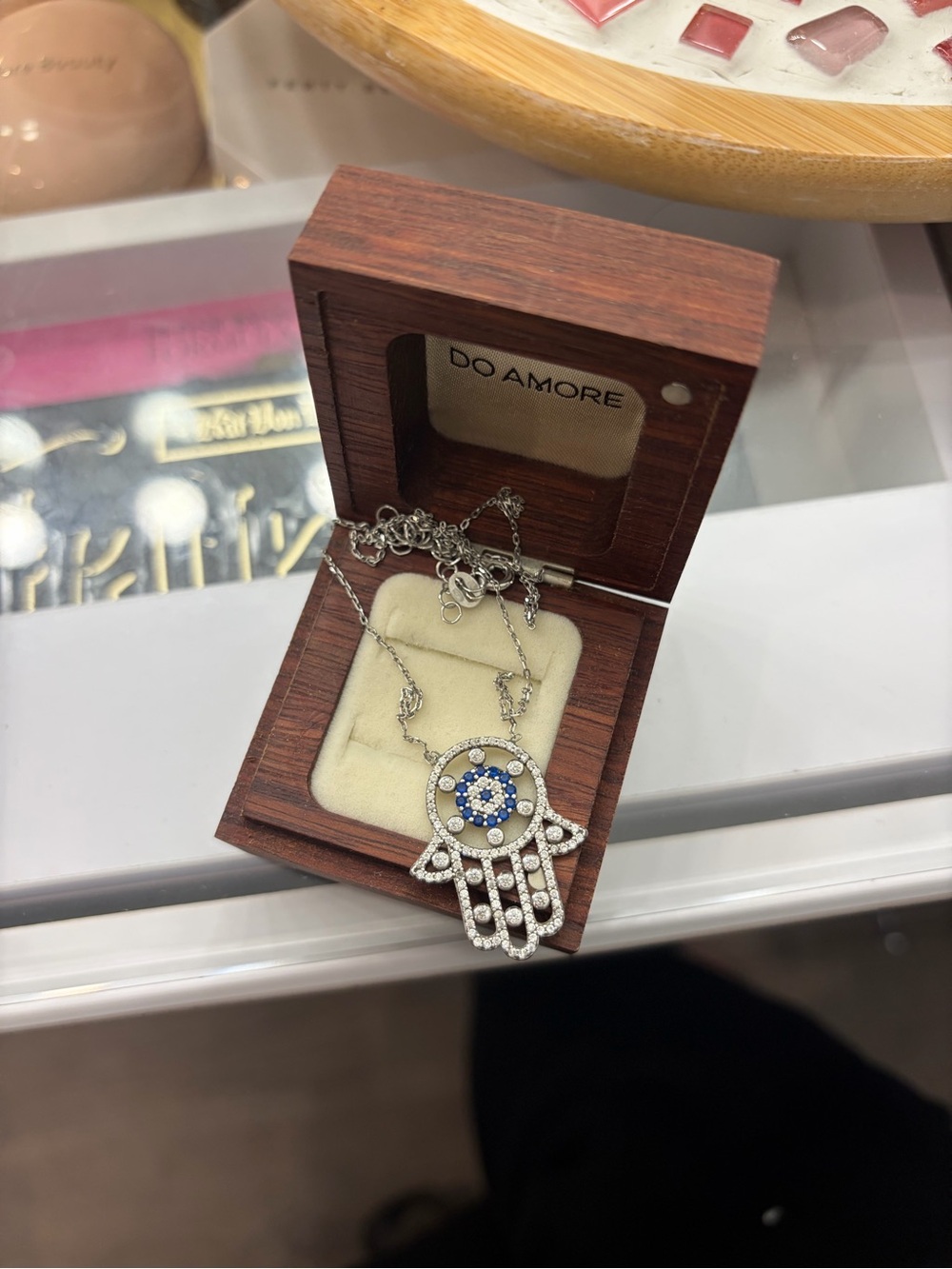 Silver Hamsa Necklace with Blue and White Stones